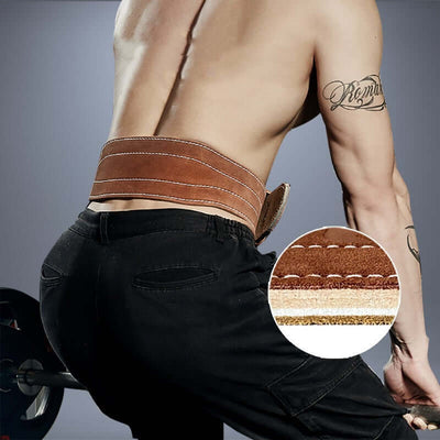 Close-up of a man wearing a brown cowhide weightlifting belt, highlighting its multi-layer design for lumbar support.